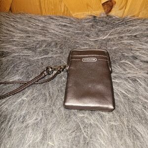 Coach Bronze Metallic vertical wristlet pouch